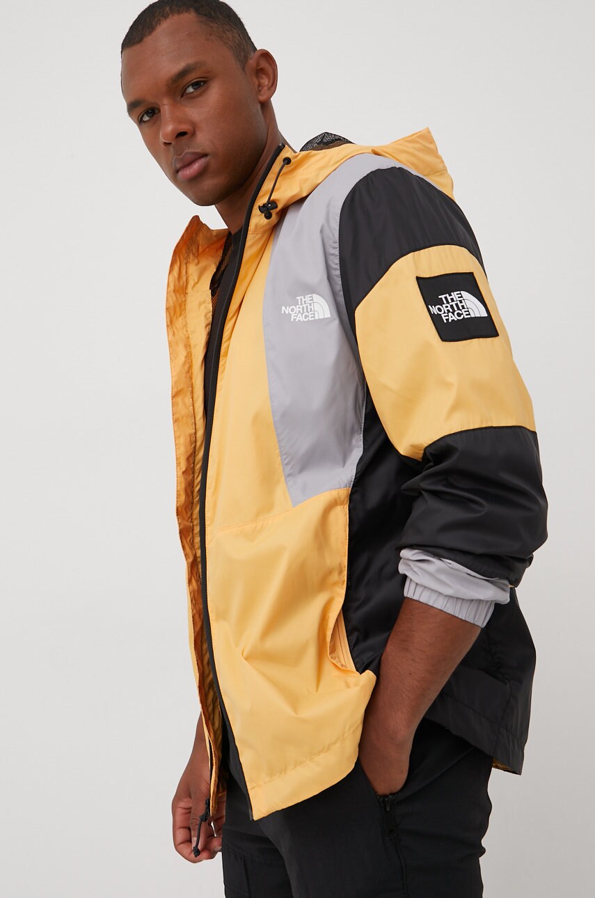 

Куртка The North Face Black Box мужская цвет оранжевый переходная