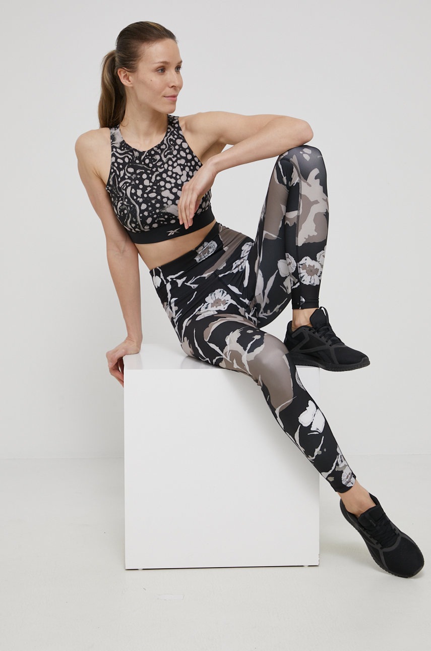 

Легінси Reebok H65568 жіночі колір коричневий візерунок