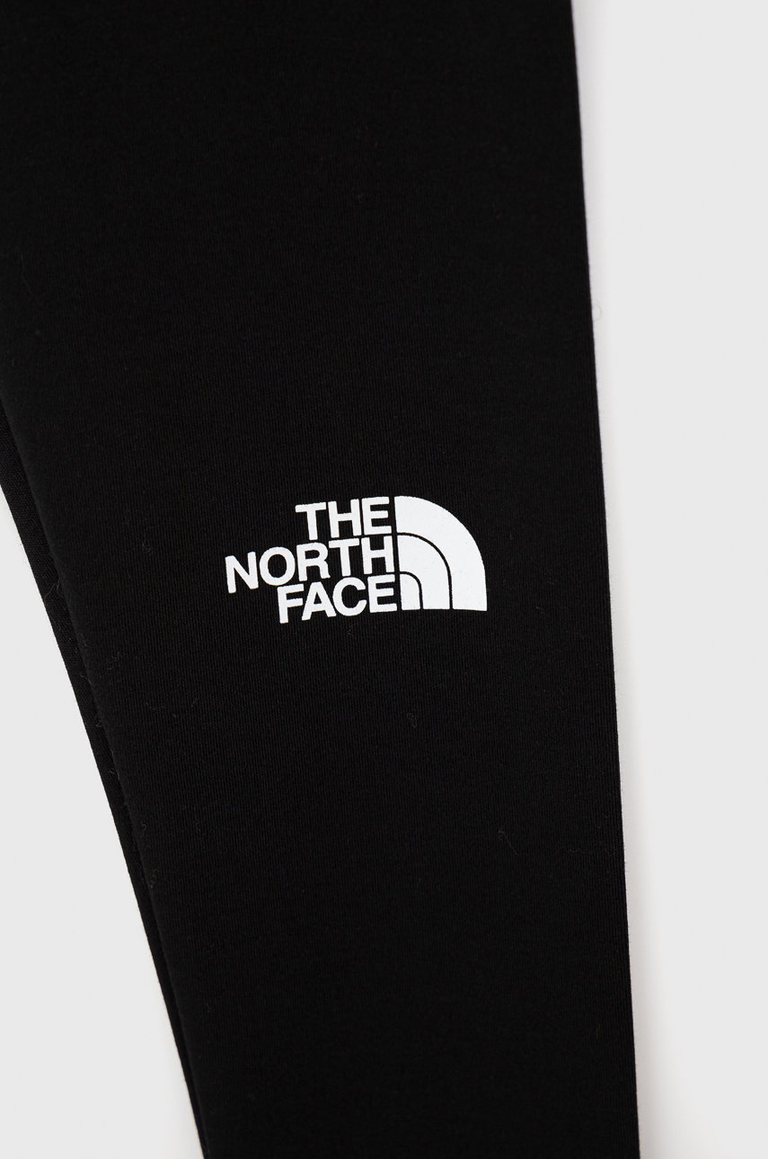 

Детские леггинсы The North Face цвет чёрный с принтом