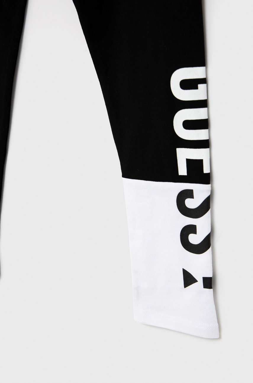 

Дитячі легінси Guess колір чорний з принтом