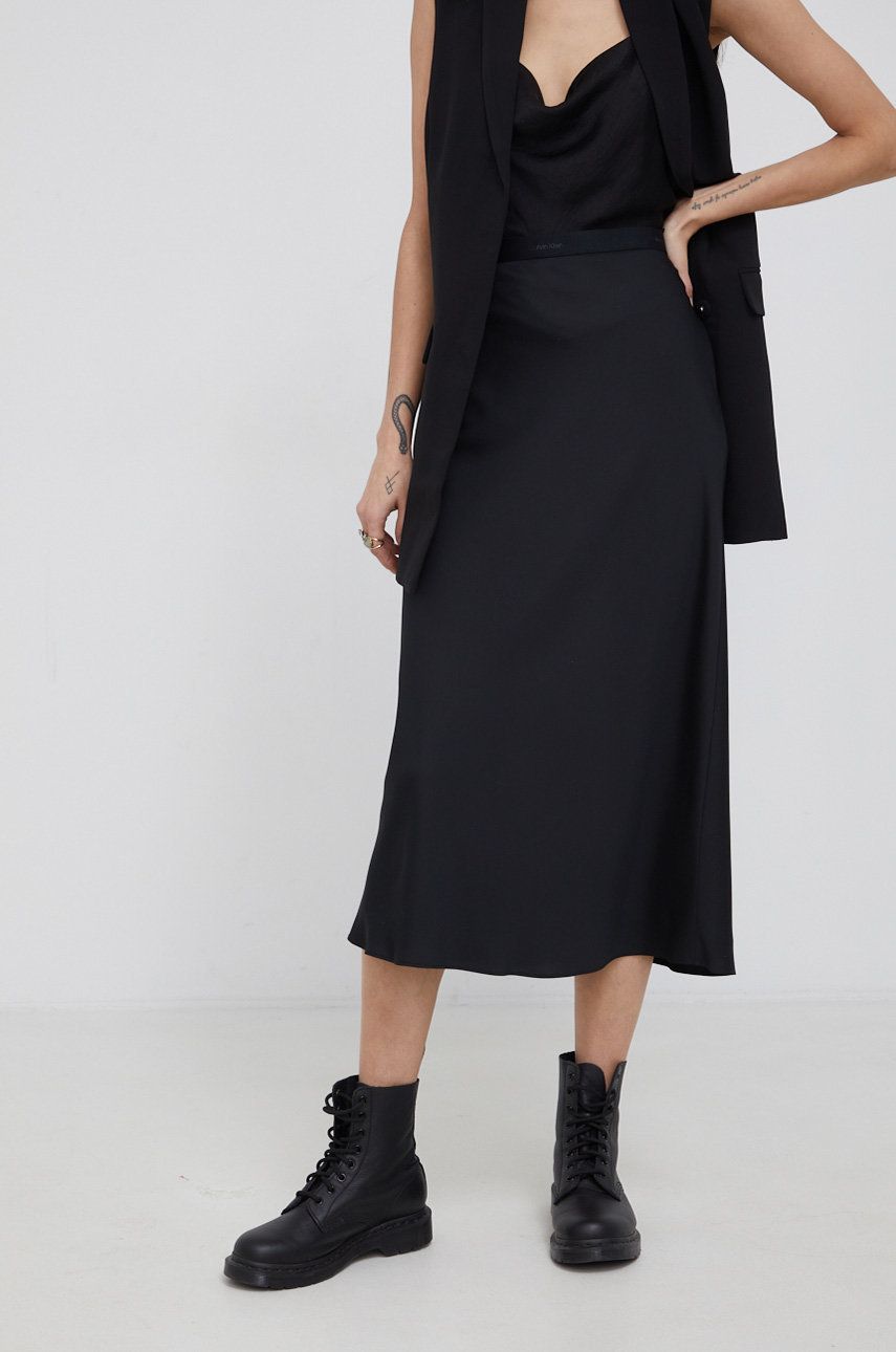 Levně Sukně Calvin Klein černá barva, midi, áčková