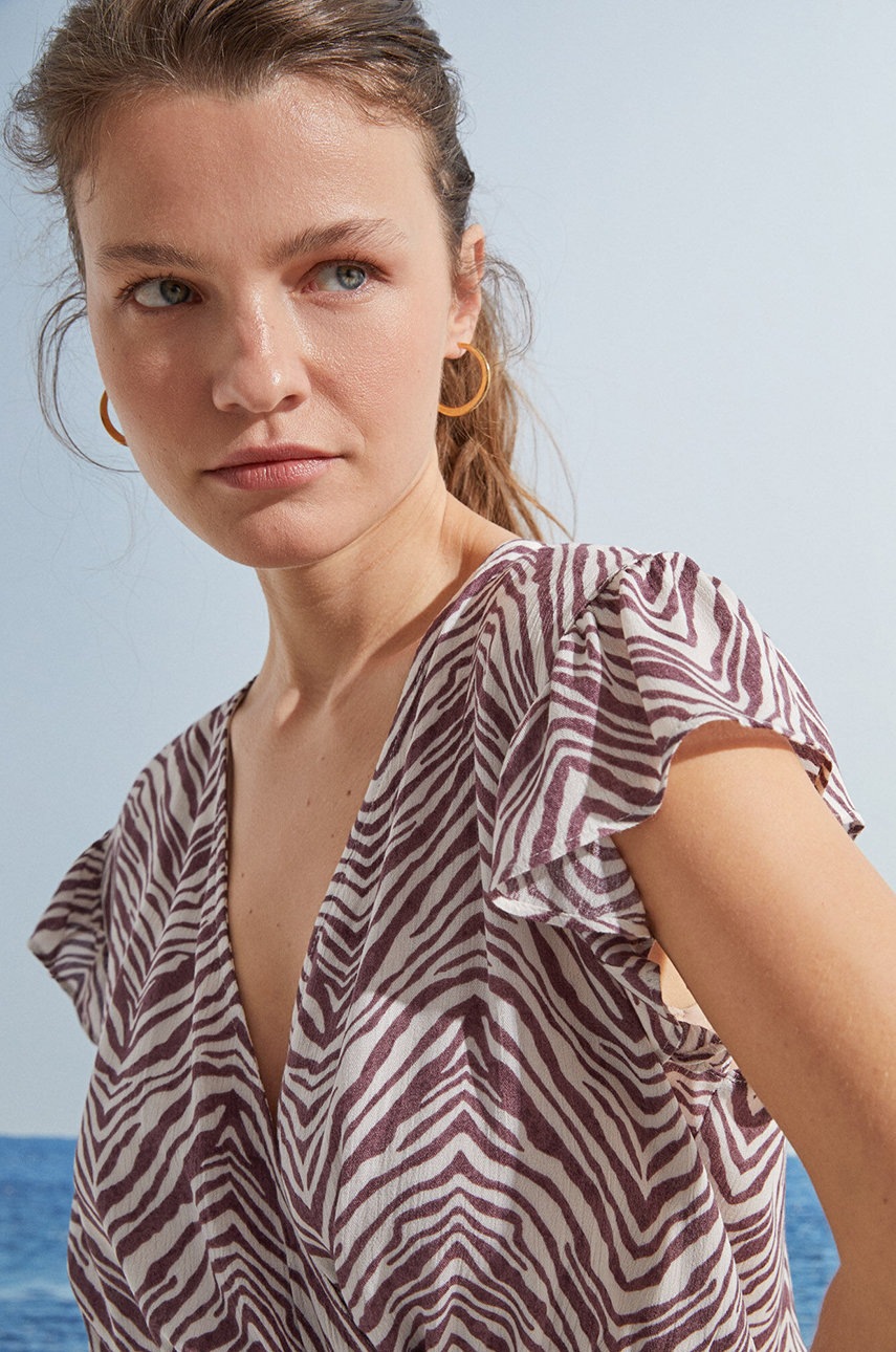 

Комбінезон women'secret Dresses Online колір бежевий декольте трикутник