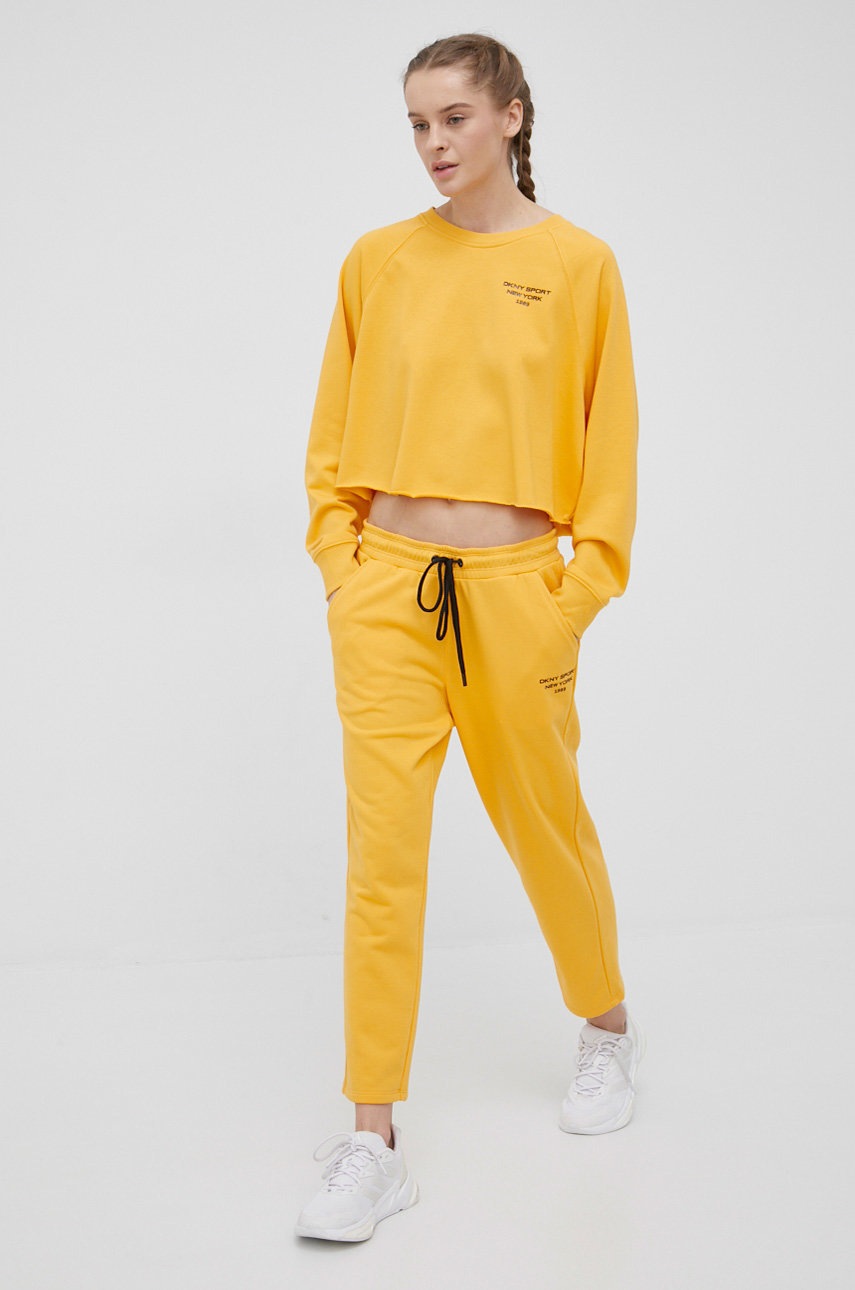

Спортивные штаны Dkny женские цвет жёлтый с принтом