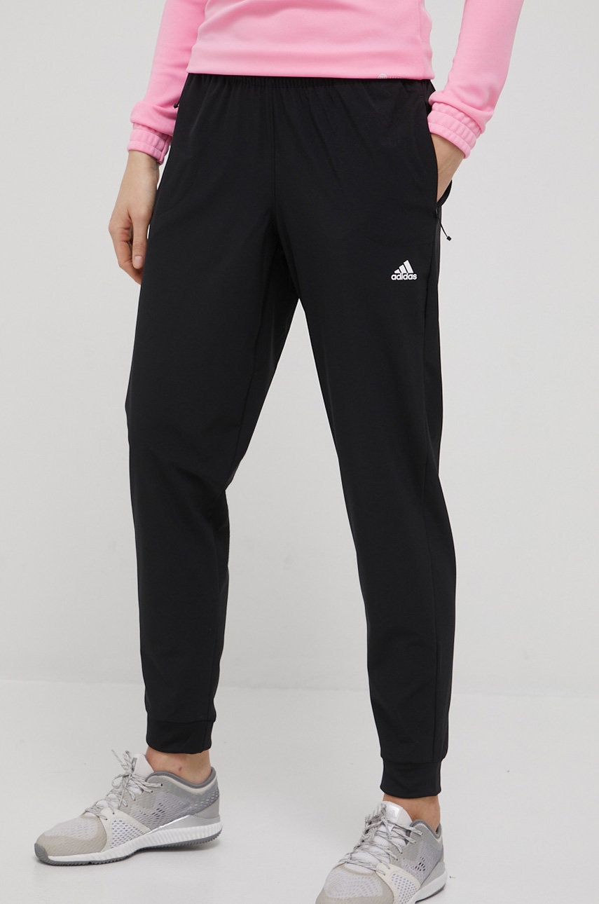 Levně Tréninkové kalhoty adidas Performance Versatile HD9622 dámské, černá barva, jednoduché, high waist