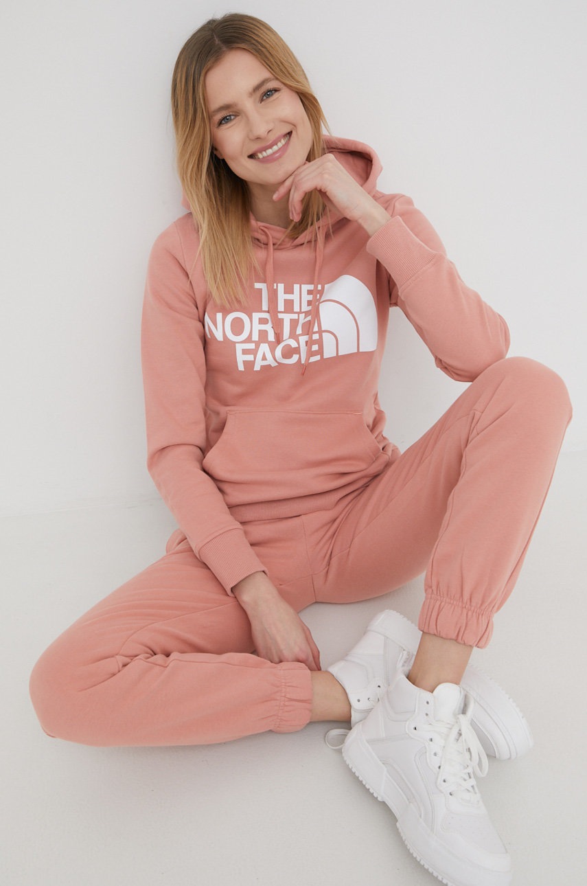 

Бавовняні спортивні штани The North Face жіночі колір рожевий однотонні