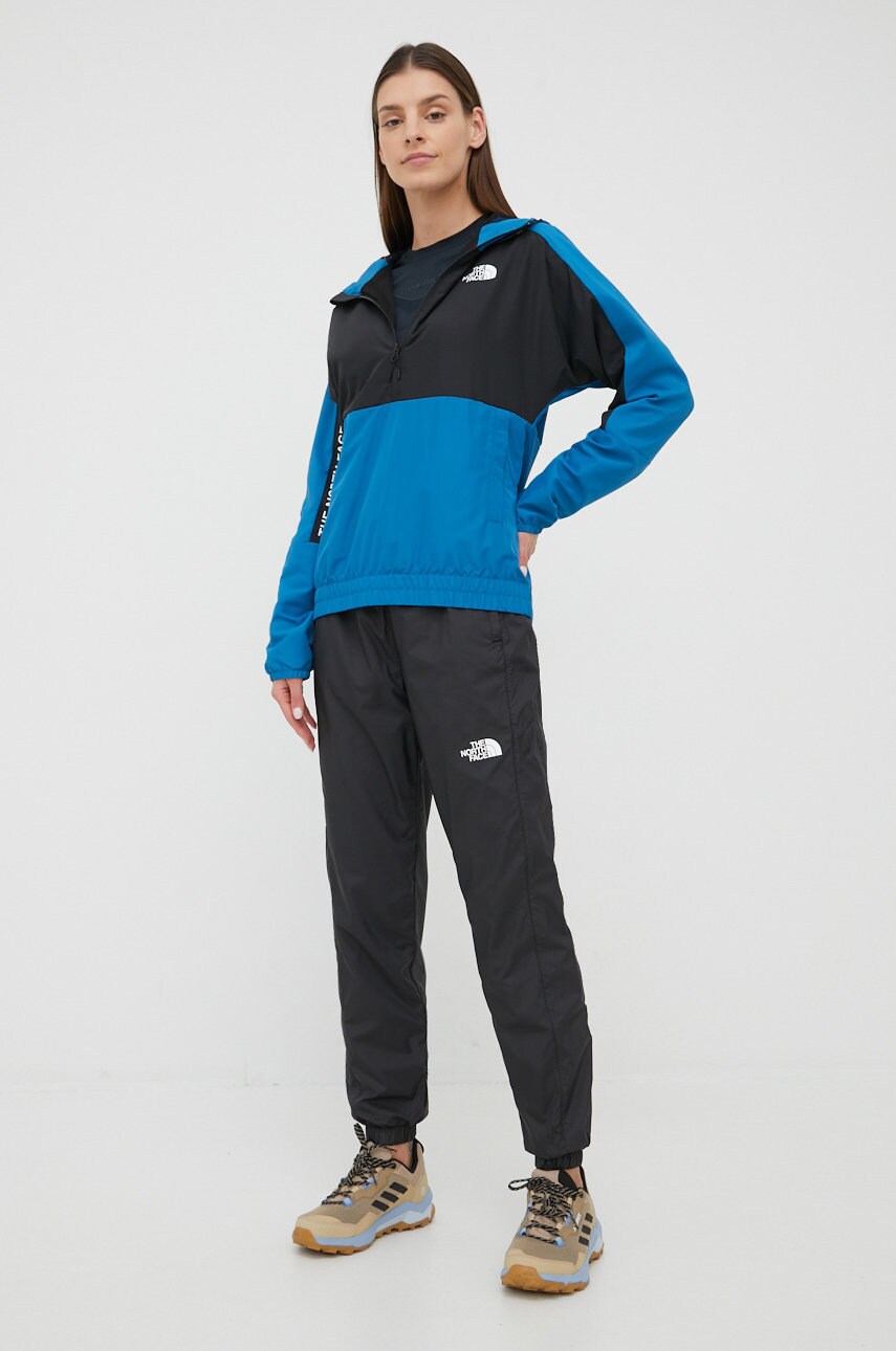 

Спортивные штаны The North Face женские цвет чёрный однотонные