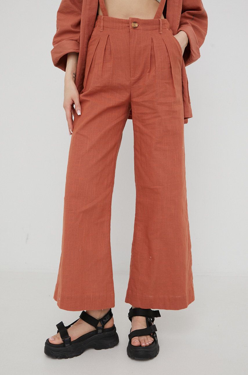 Billabong spodnie bawełniane Billabong x Madi damskie kolor pomarańczowy szerokie high waist