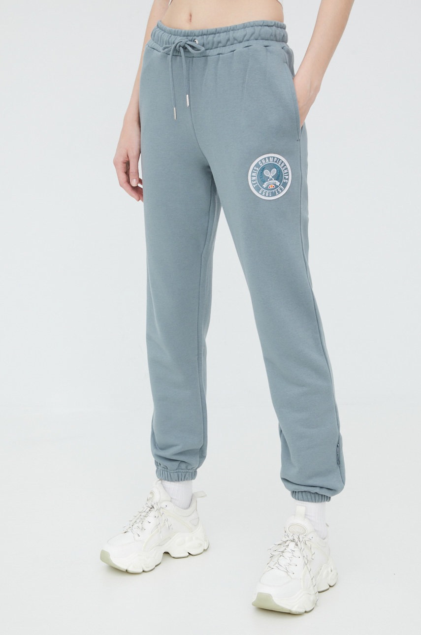 

Спортивные штаны Ellesse женские цвет зелёный с аппликацией