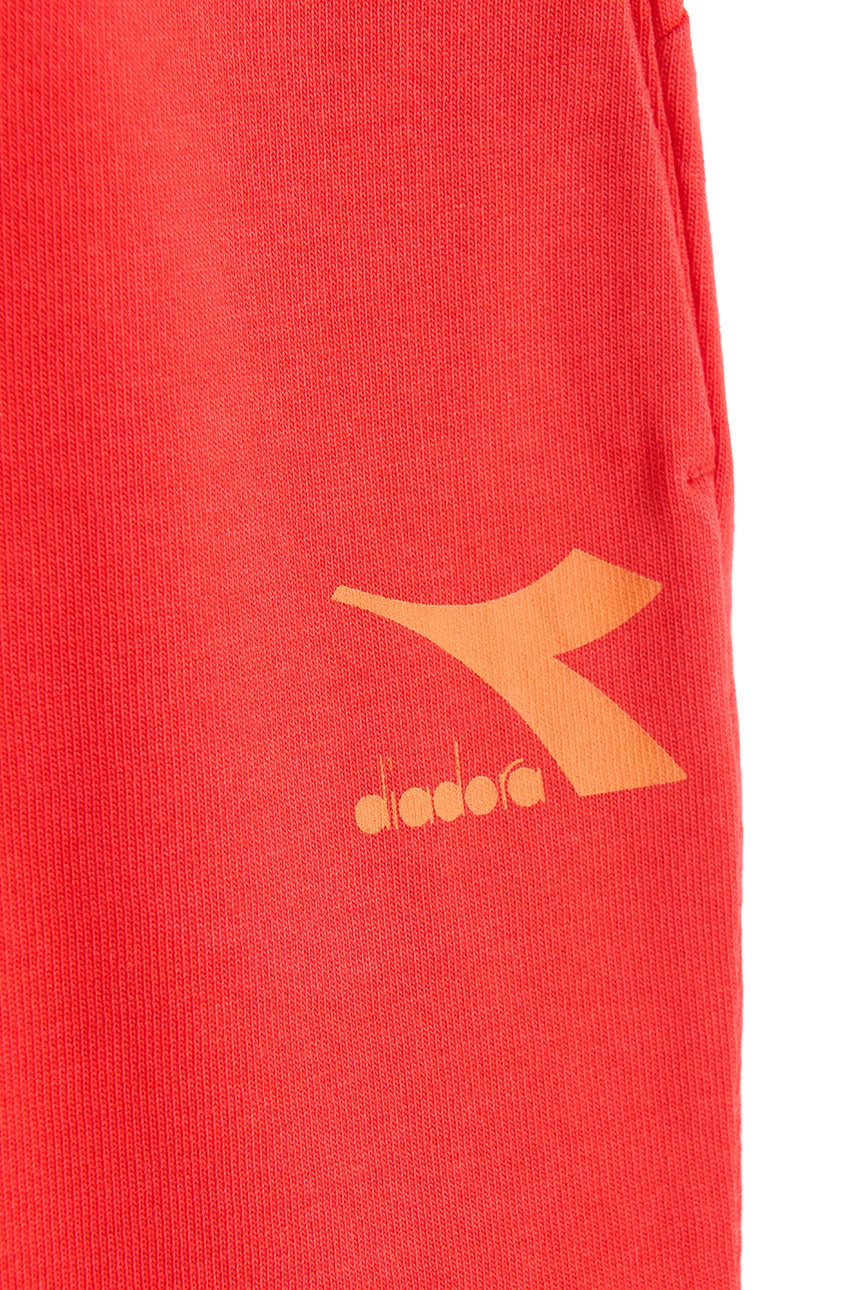 

Дитячі спортивні штани Diadora колір червоний однотонні