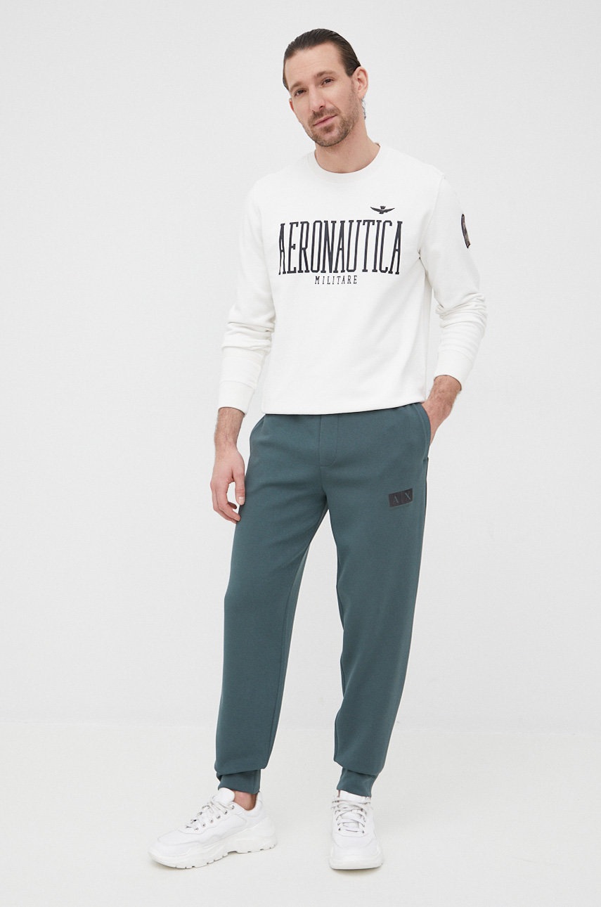 

Брюки Armani Exchange мужские цвет зелёный однотонные