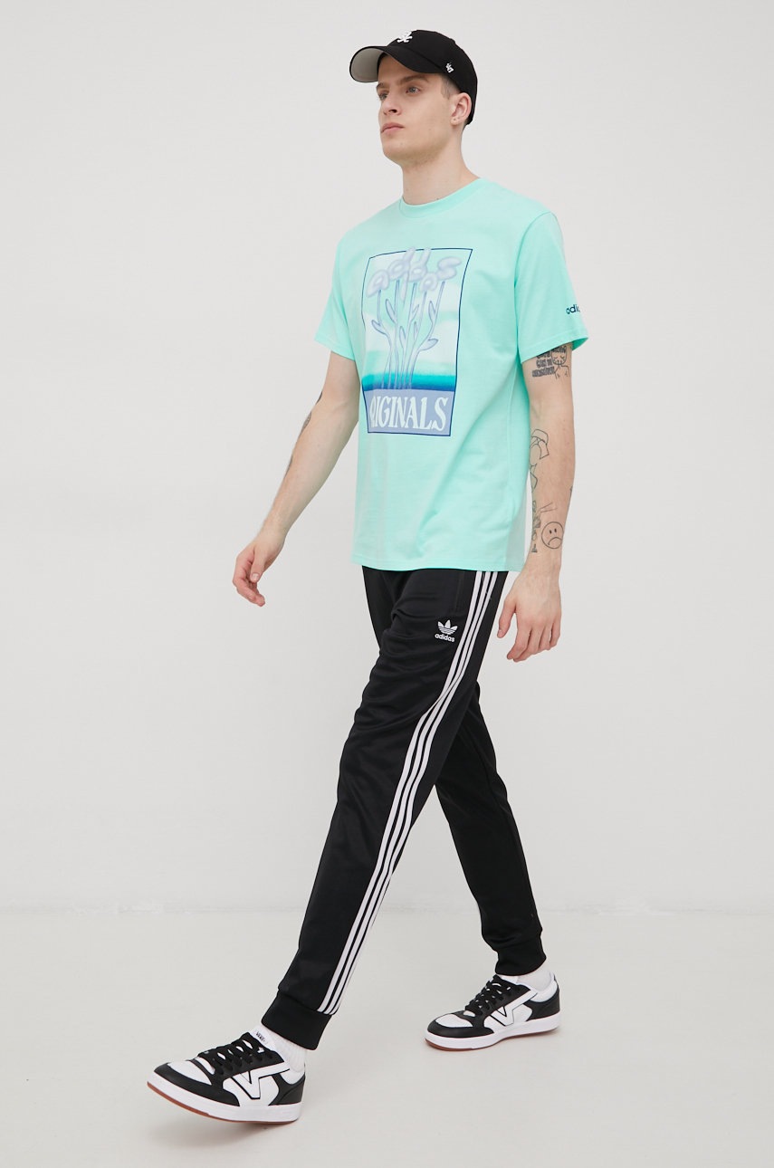 

Брюки adidas Originals HC1934 мужские цвет чёрный гладкие