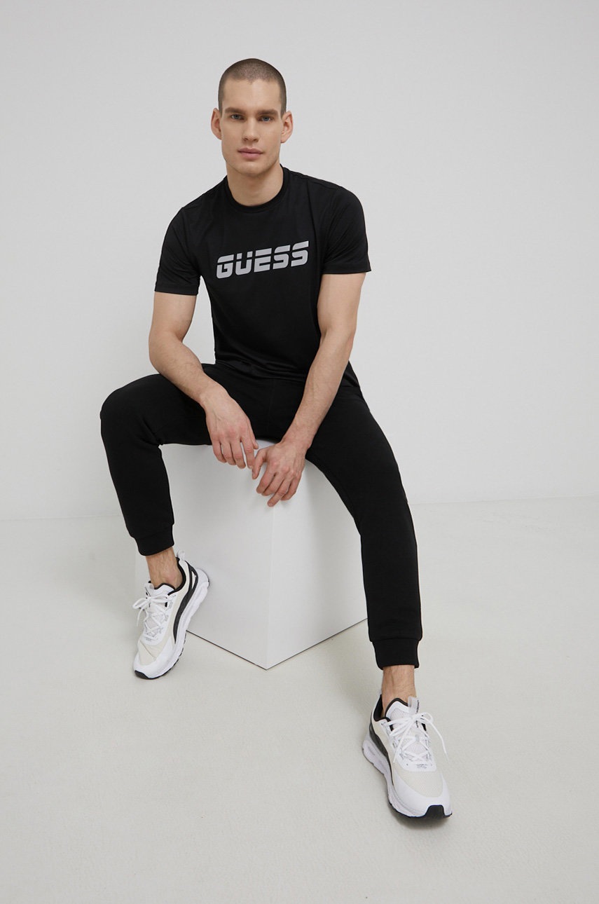 

Брюки Guess мужские цвет чёрный однотонные