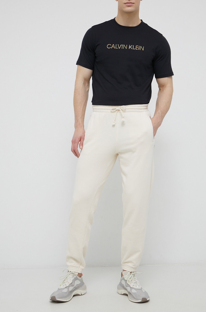 Reebok classic pantaloni de bumbac bărbați, culoarea crem, material neted