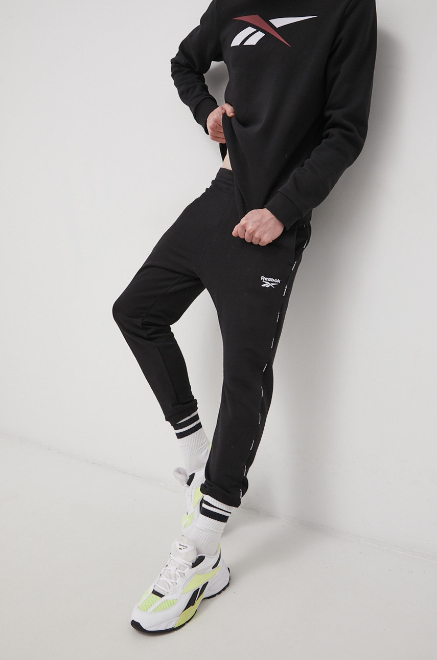 

Брюки Reebok HA1070 мужское цвет чёрный гладкие