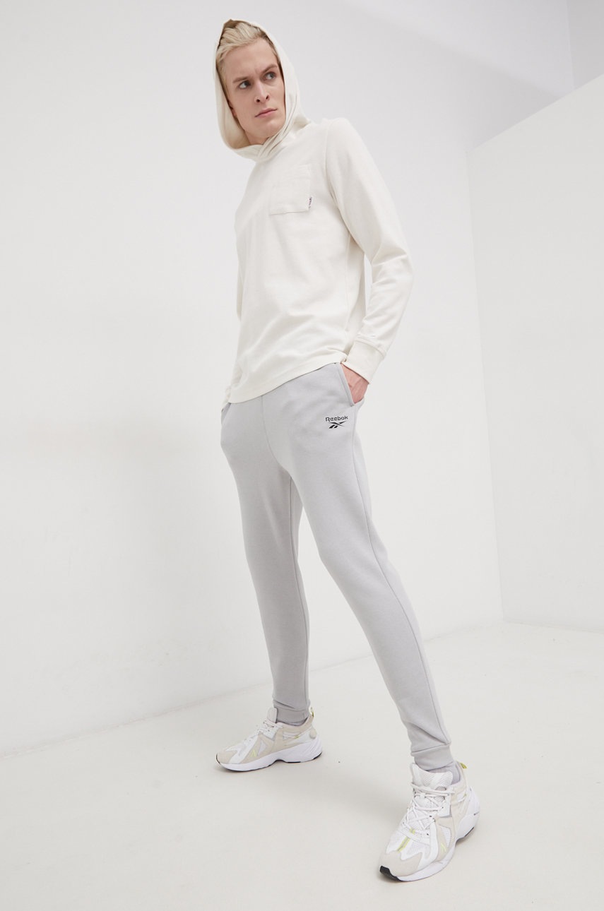 

Брюки Reebok HG4457 мужское цвет серый гладкие