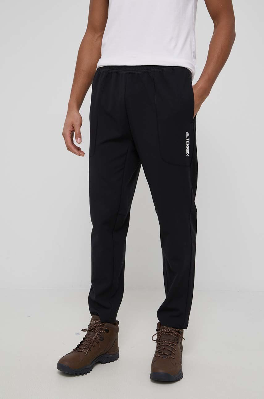 Levně Outdoorové kalhoty adidas TERREX GM4771 pánské, černá barva