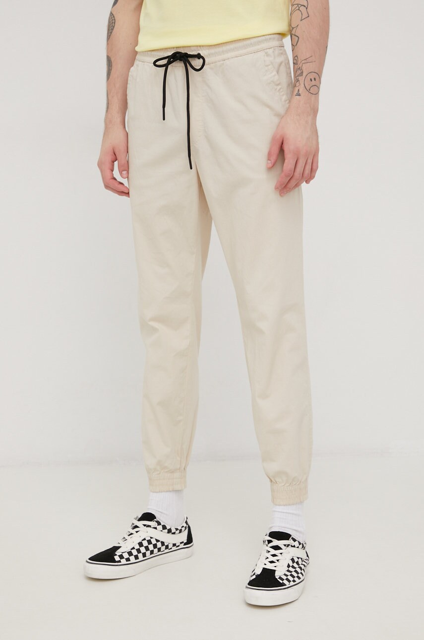 

Штани Tom Tailor чоловічі колір бежевий фасон jogger