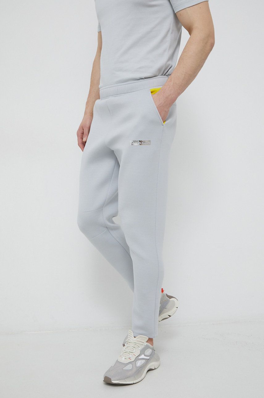 Kalhoty Calvin Klein Performance pánské, šedá barva, hladké - šedá -  8% Elastan