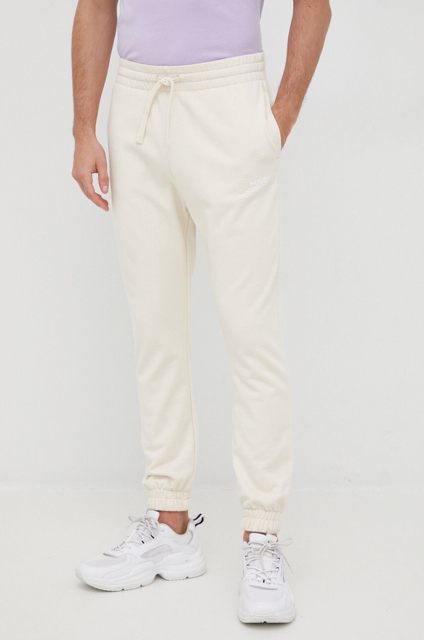Hugo pantaloni de bumbac barbati, culoarea bej, cu imprimeu