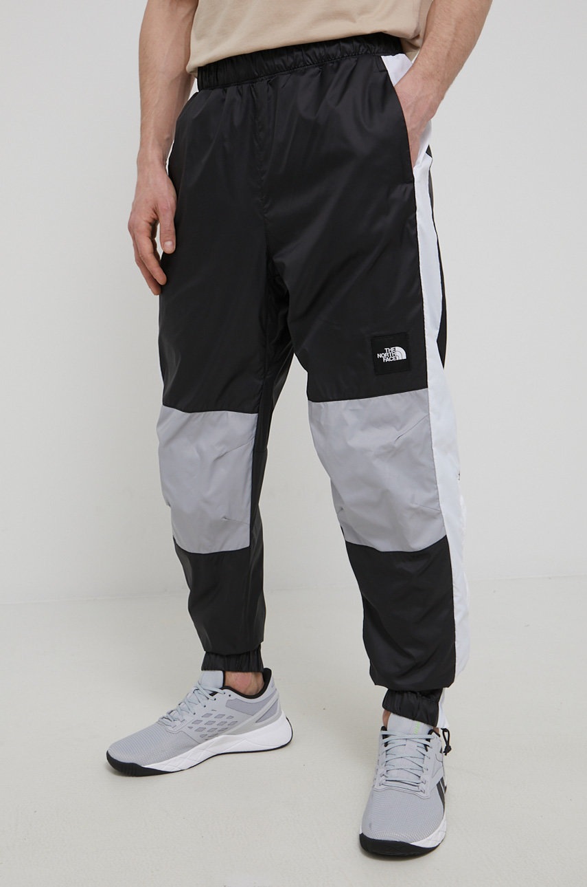 

Панталони The North Face мъжки в черно с кройка тип jogger, Черен