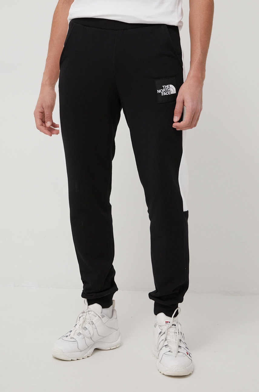 

Памучен панталон The North Face мъжко в черно с десен, Черен