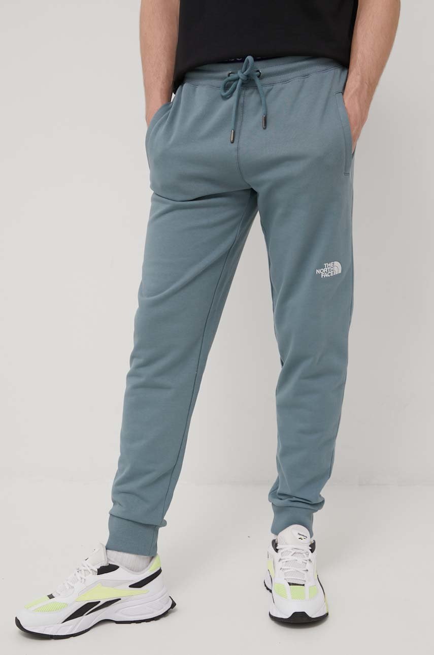 

Бавовняні штани The North Face чоловічі однотонні