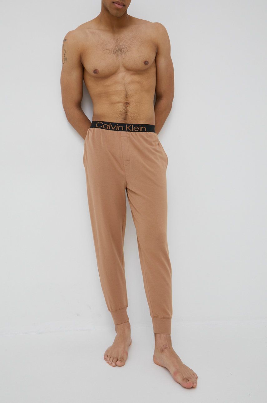 Tepláky Calvin Klein Underwear pánské, hnědá barva, hladké - hnědá -  77% Bavlna