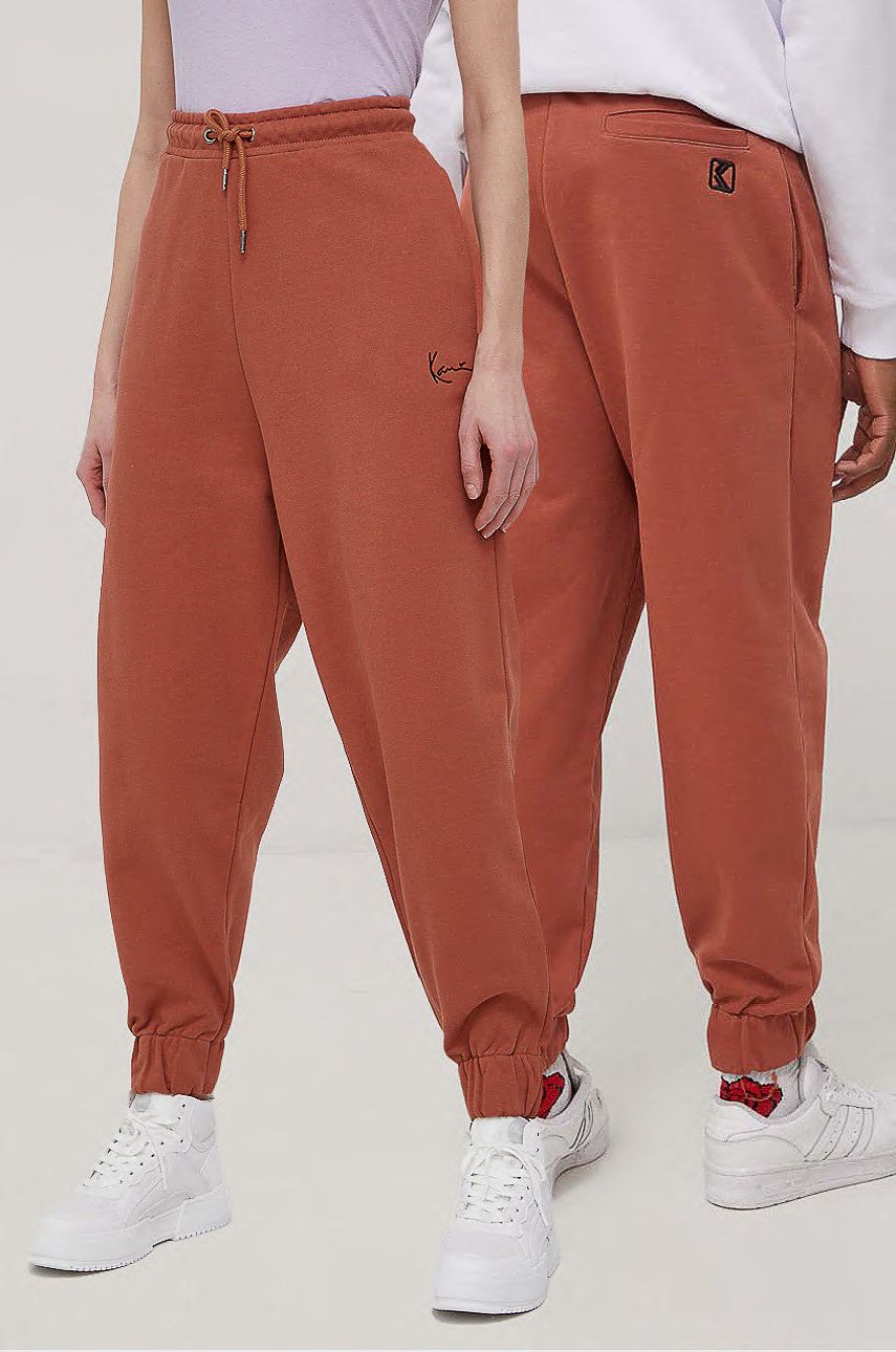 Karl Kani spodnie bawełniane kolor brązowy gładkie