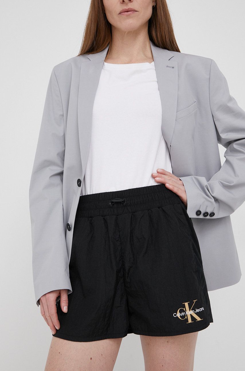 Levně Kraťasy Calvin Klein Jeans dámské, černá barva, s potiskem, medium waist