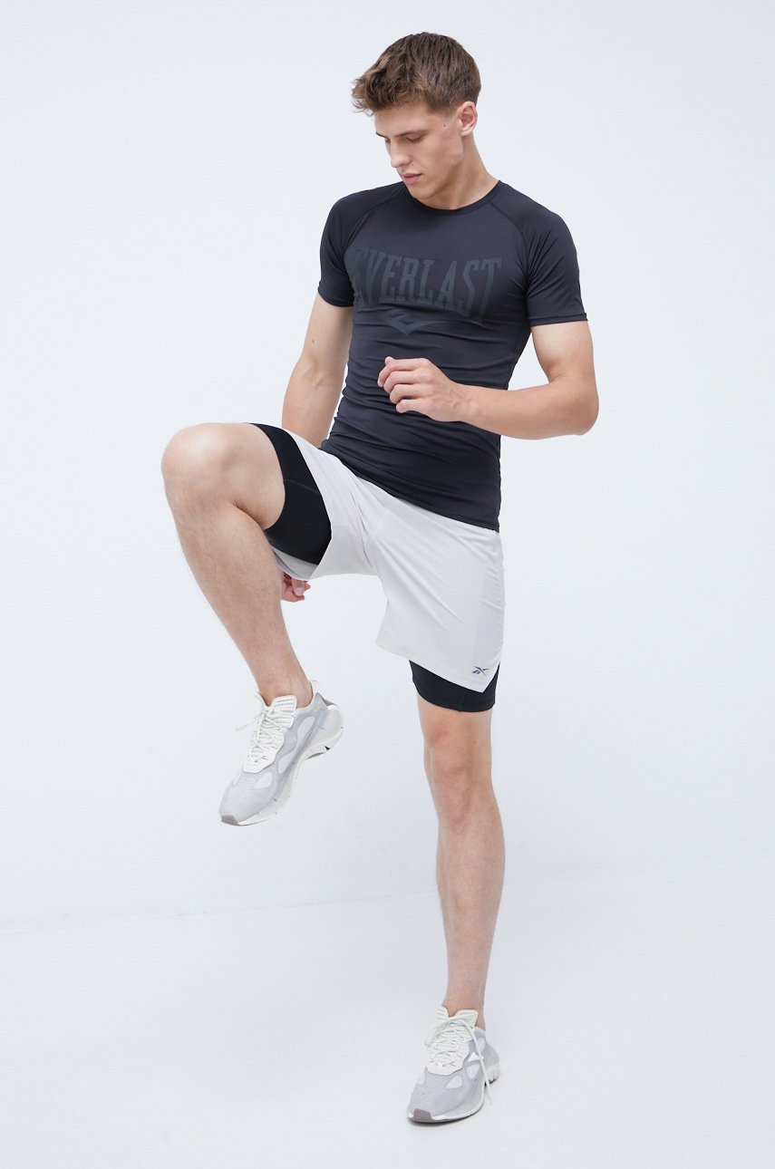 

Шорти для бігу Reebok HA9069 чоловічі колір бежевий