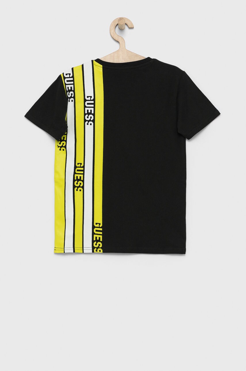 

Дитяча бавовняна футболка Guess колір зелений з принтом
