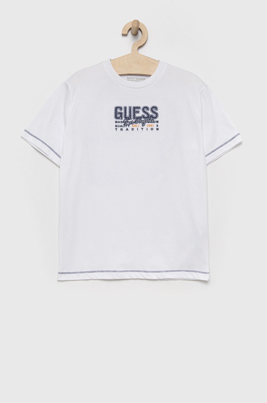 

Детская хлопковая футболка Guess цвет белый с принтом