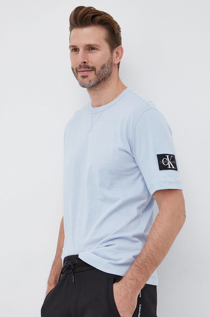 

Памучна тениска Calvin Klein Jeans с апликация, Син
