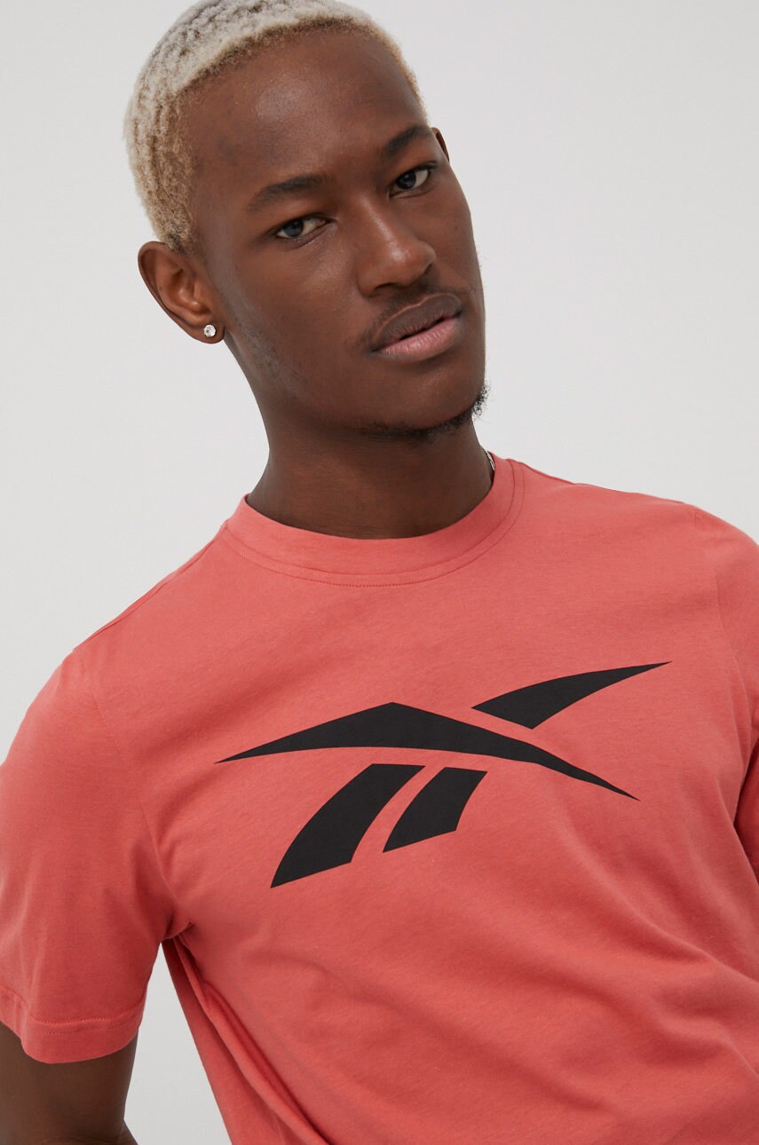 

Памучна тениска Reebok HD3999 в оранжево с принт, Оранжев
