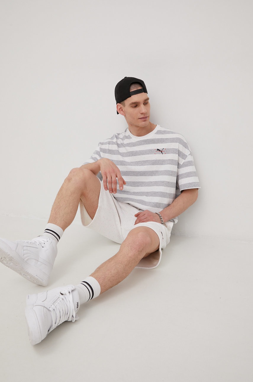 

Хлопковая футболка Puma 533956 цвет серый узорный