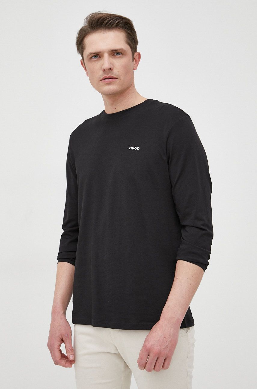Levně Bavlněné tričko s dlouhým rukávem HUGO černá barva, s potiskem, 50466159