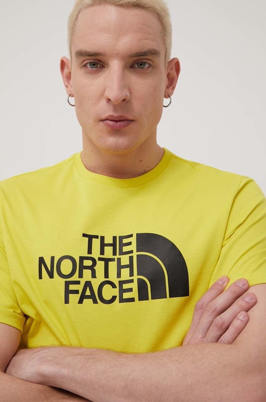 The north face tricou din bumbac culoarea galben, cu imprimeu