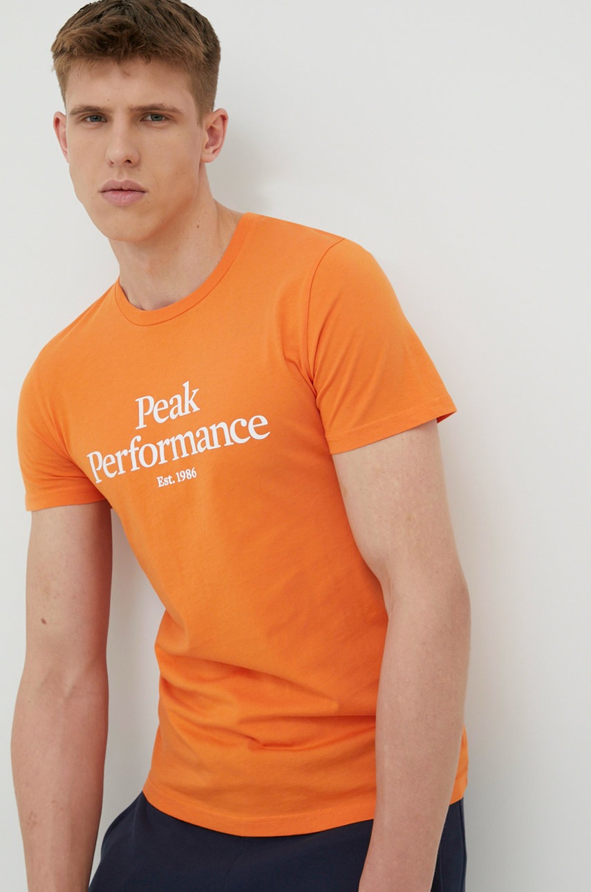 

Памучна тениска Peak Performance в оранжево с принт, Оранжев