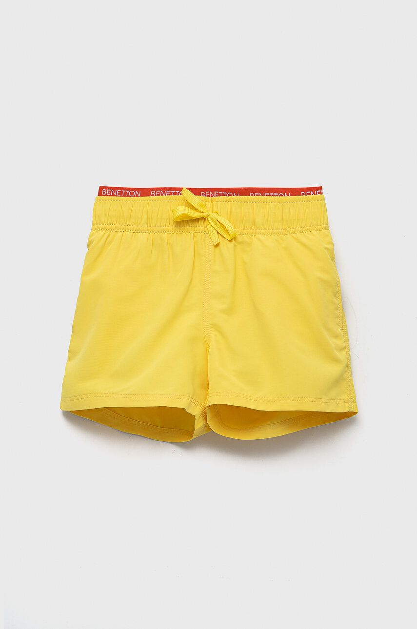 Dětské plavkové šortky United Colors of Benetton žlutá barva - žlutá -  100 % Polyester