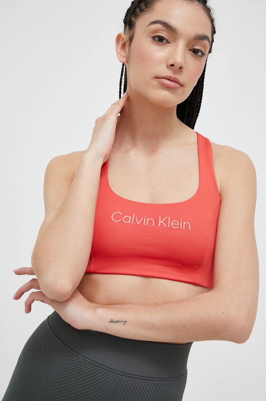 Levně Sportovní podprsenka Calvin Klein Performance Essentials oranžová barva