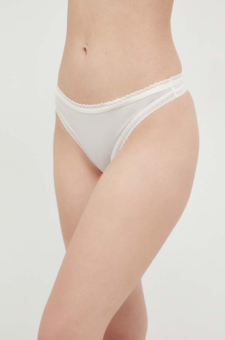 Levně Tanga Calvin Klein Underwear bílá barva