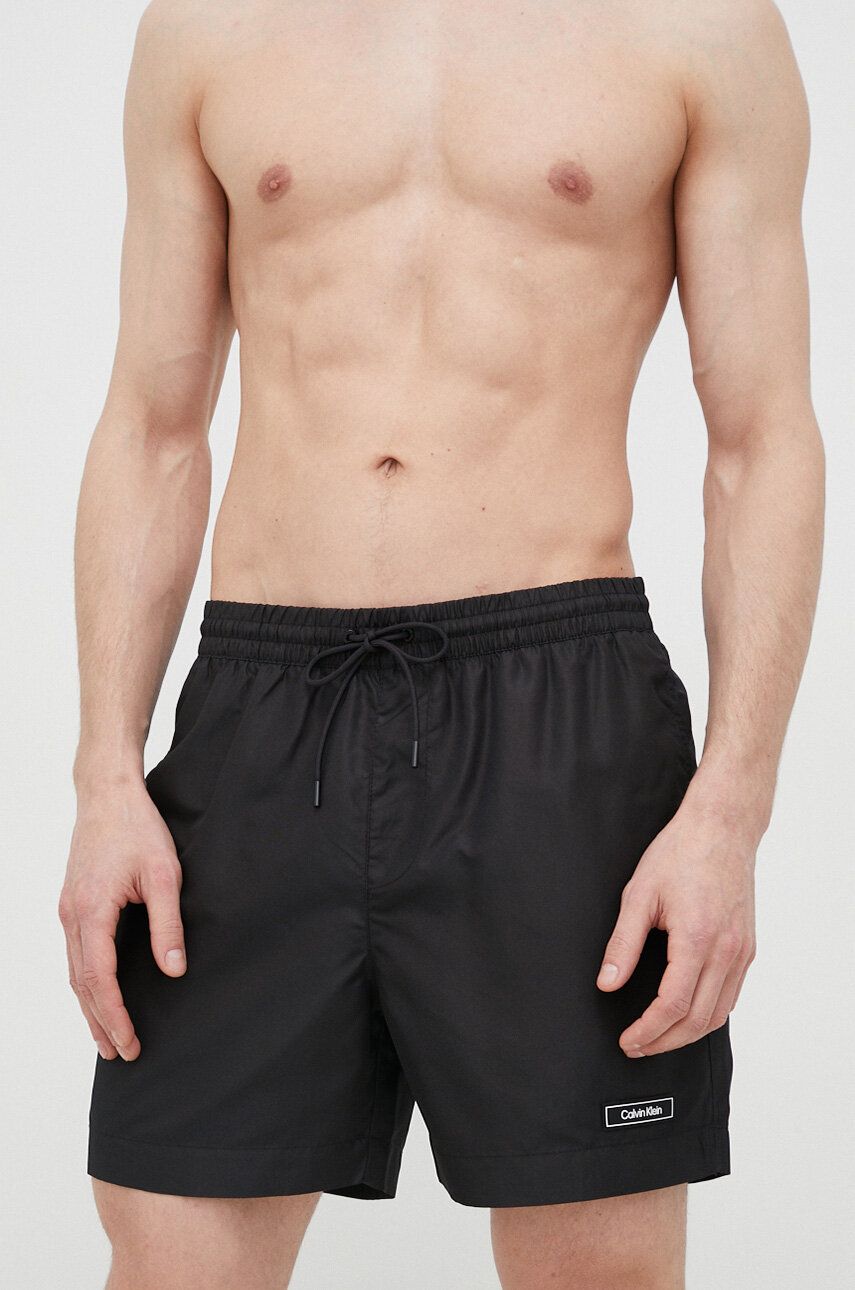 Plavkové šortky Calvin Klein černá barva - černá -  100 % Polyester