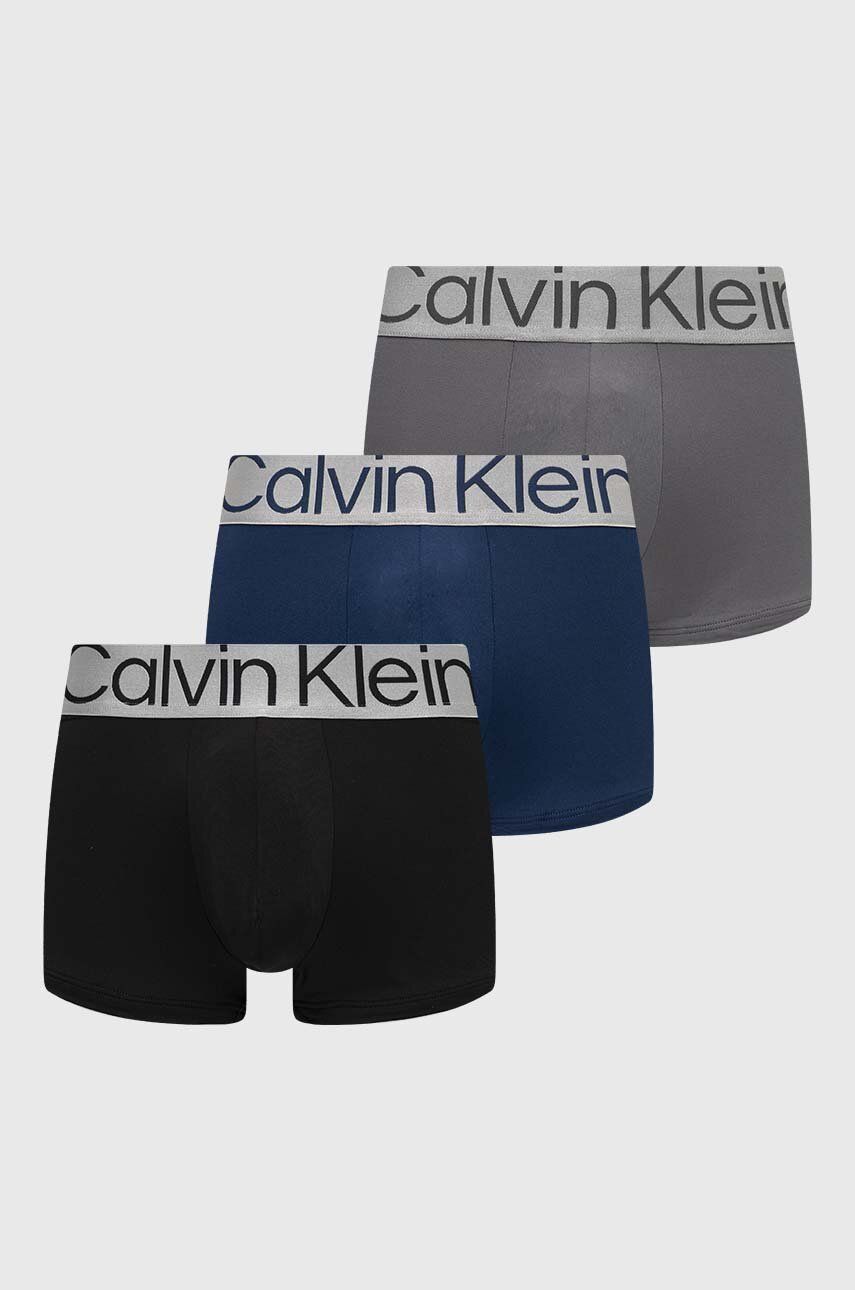 Levně Boxerky Calvin Klein Underwear 3-pack pánské, tmavomodrá barva, 000NB3074A