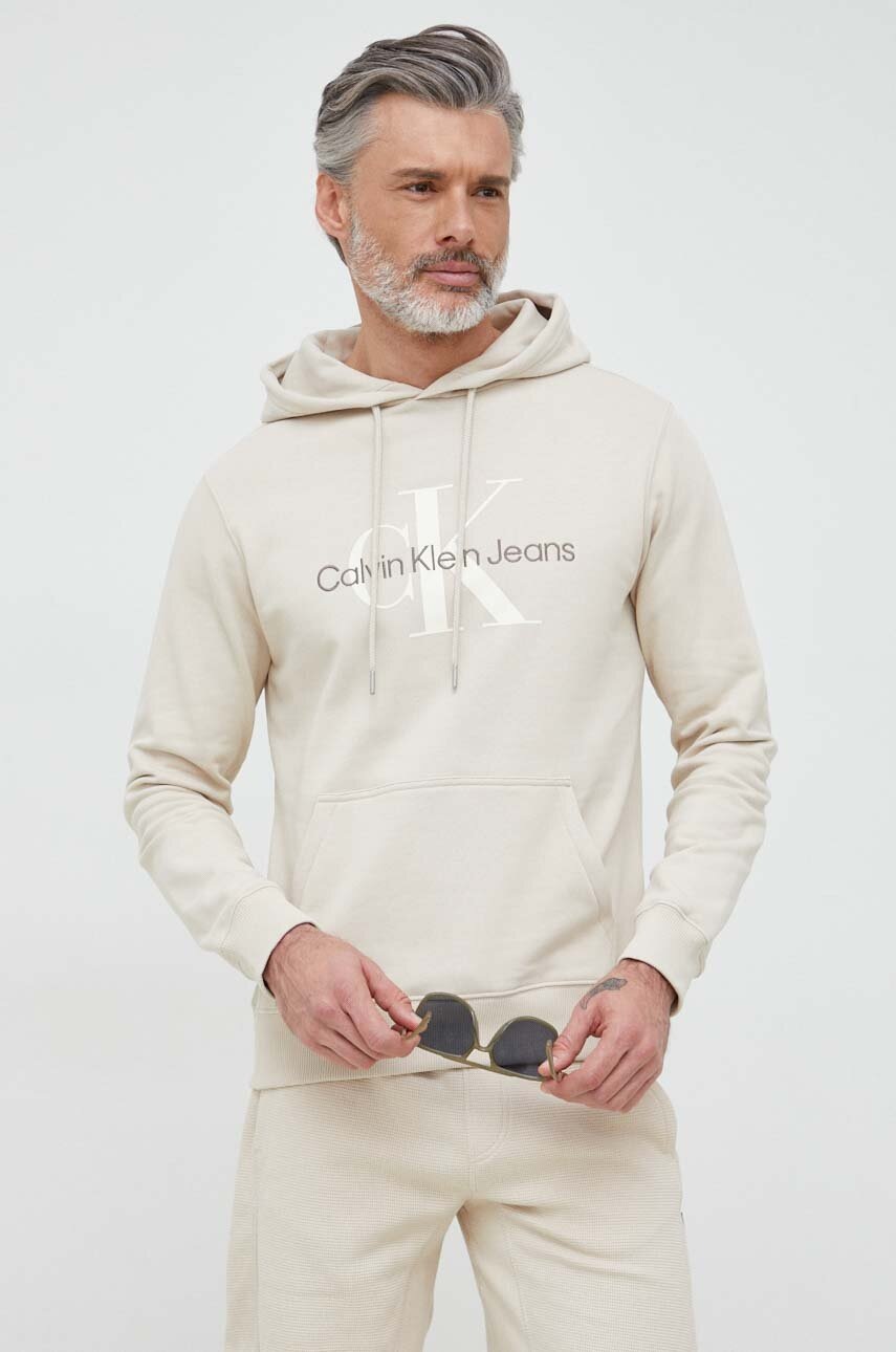

Памучен суичър Calvin Klein Jeans в синьо с качулка с десен, Бежов