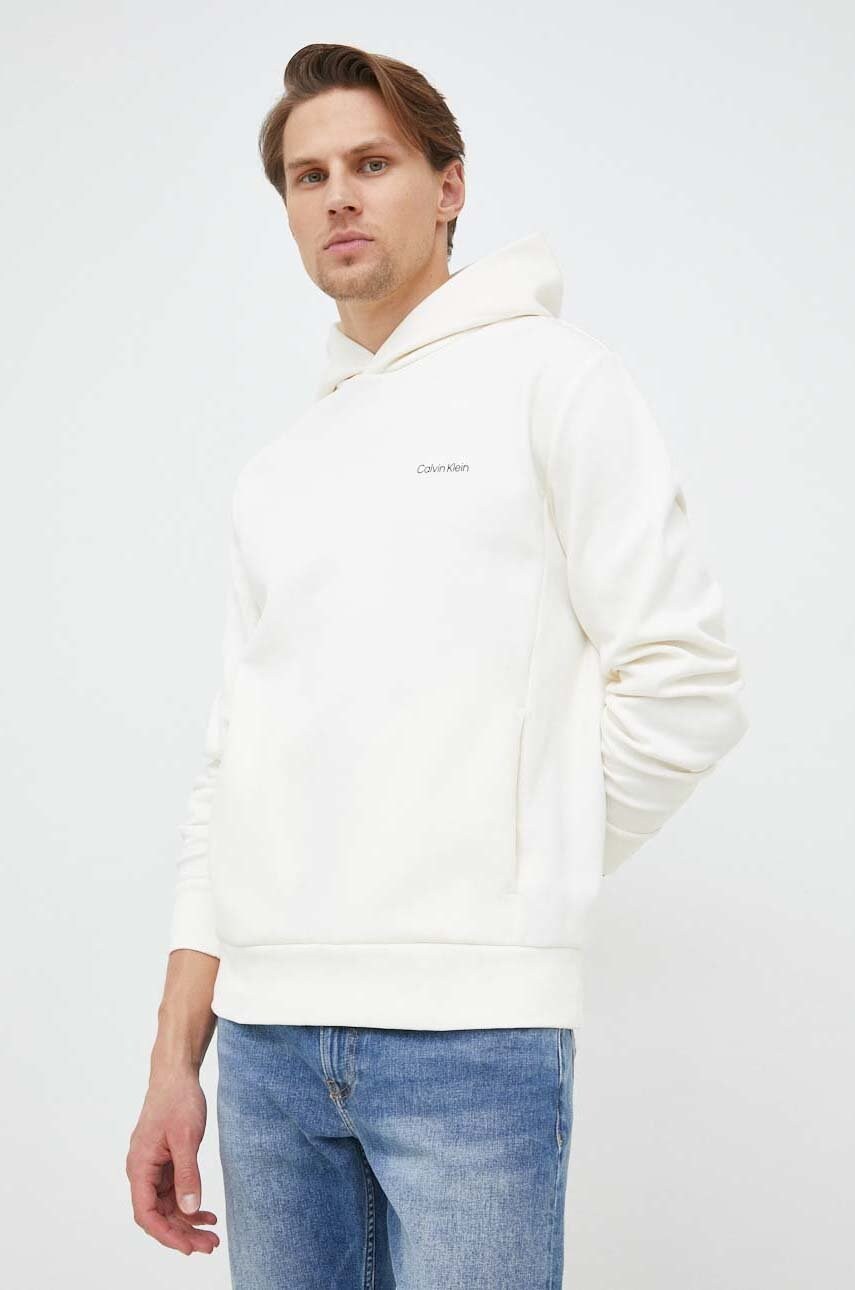 Levně Mikina Calvin Klein pánská, béžová barva, s kapucí, hladká
