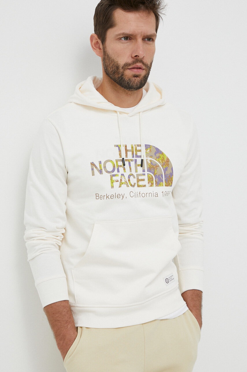 

Бавовняна кофта The North Face чоловіча колір бежевий з капюшоном з принтом