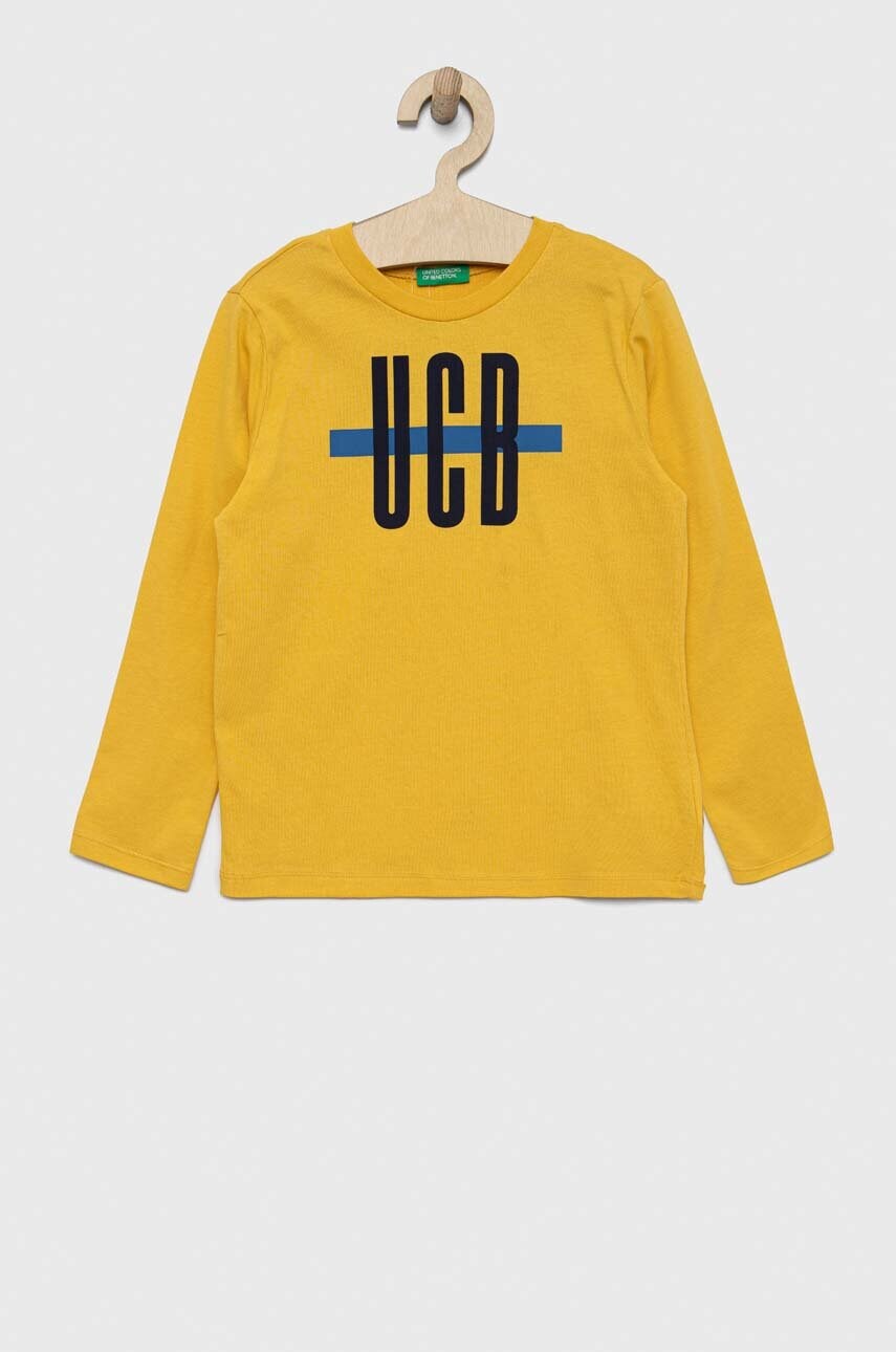 

Дитячий бавовняний лонгслів United Colors of Benetton колір жовтий з принтом