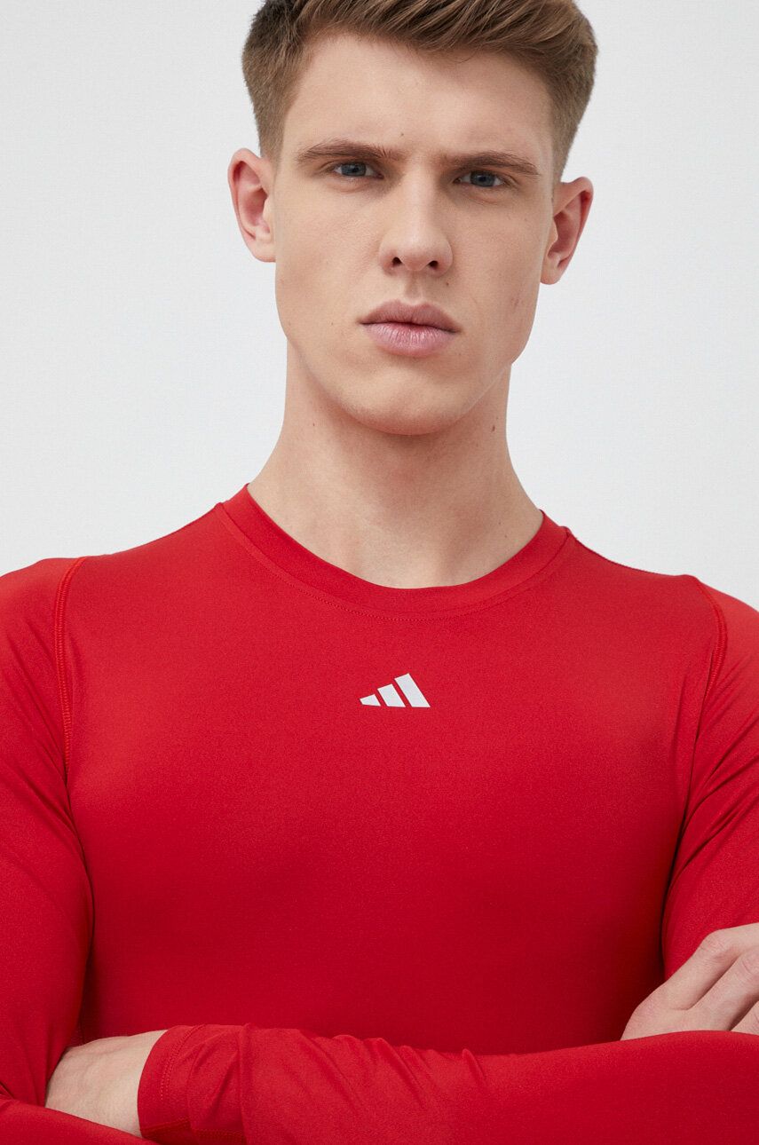 Levně Tréninkové tričko s dlouhým rukávem adidas Performance červená barva