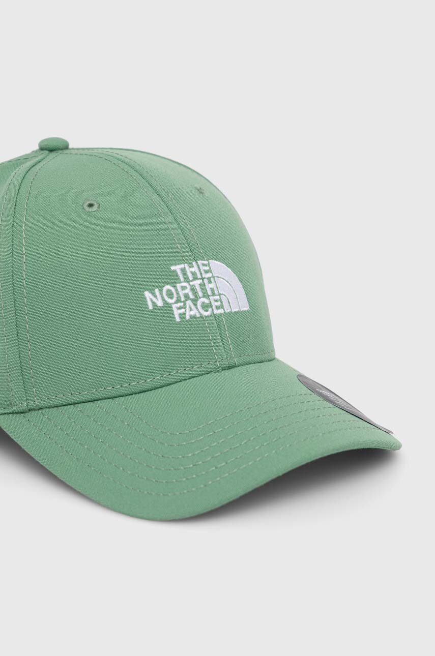 

Кепка The North Face колір зелений з аплікацією