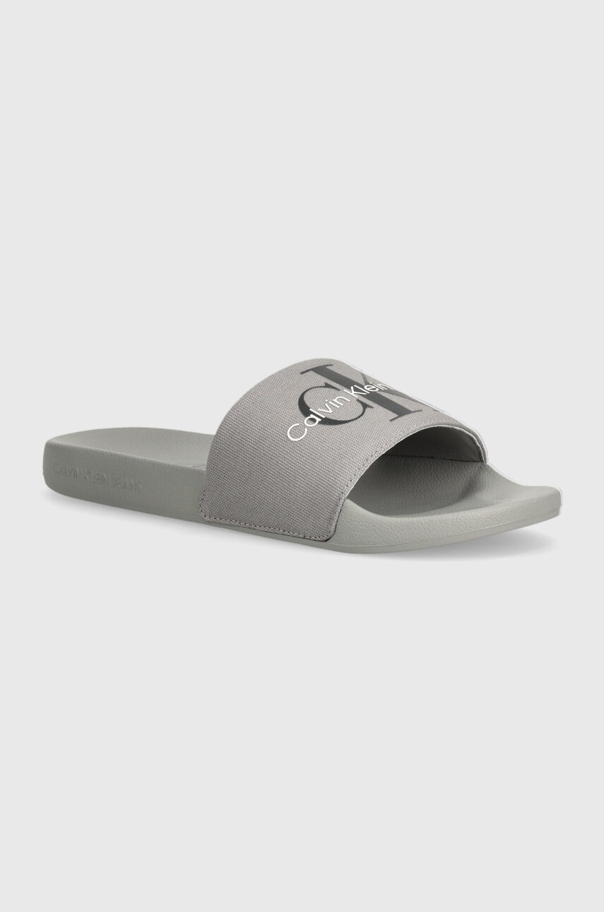 

Чехли Calvin Klein Jeans SLIDE MONOGRAM CO в оранжево YM0YM00061, Сив